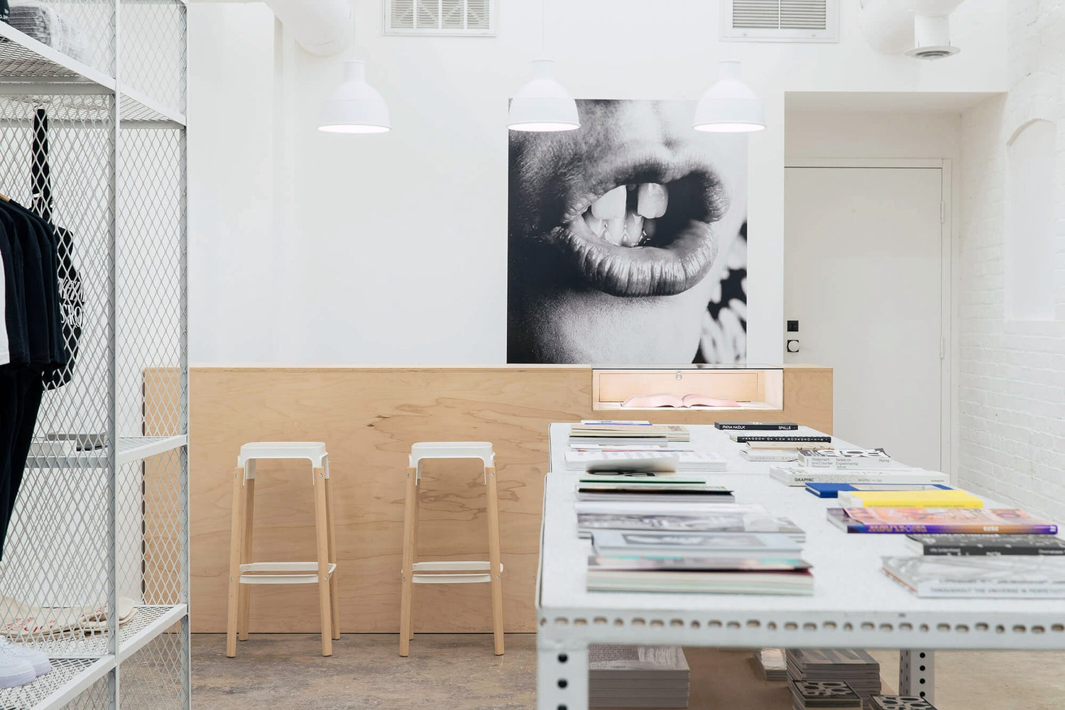 Bright white and light wood studio space.